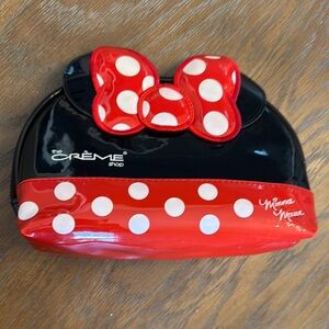 Minnie Mouse Cosmetic bag with Minnie Ears & trademark bow. 9 x 7 x 4 inches.